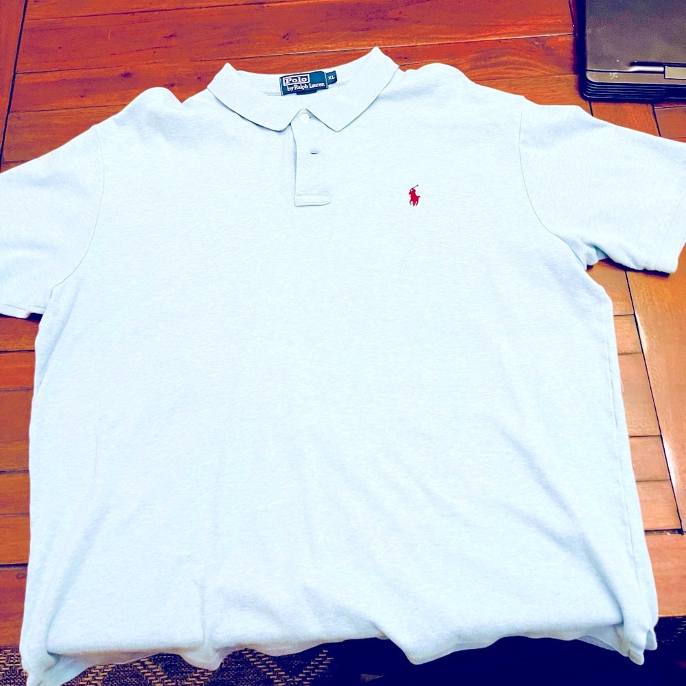 Light blue slightly worn polo. Soft cotton